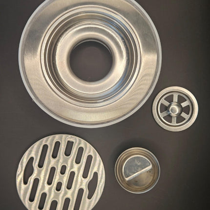 Coladera Floor Drain M-0211-1 Acero Inox 12X12 C/Atrapa Pelo y Check Antiolor
