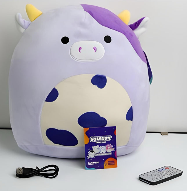 ISP-SQUISHY PELUCHE CON BOCINA PORTÁTIL INCORPORADA VAQUITA